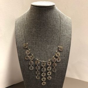 Silver tone necklace.